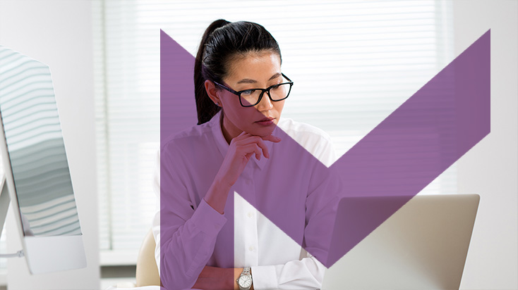 Young woman contemplating a problem at work