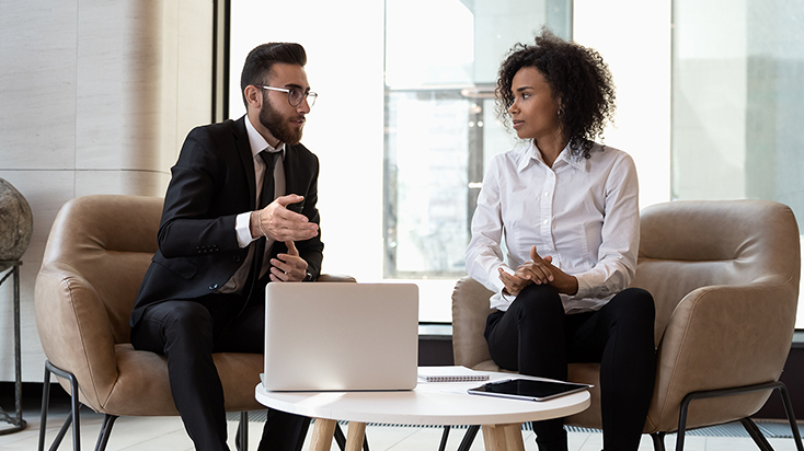 Business partners having a discussion at a table