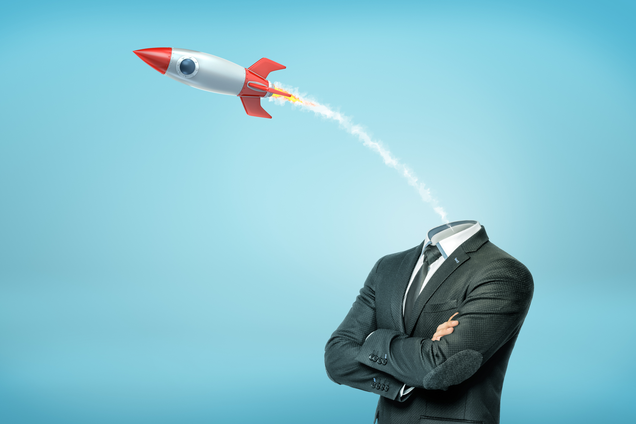 A businessman with crossed arms and with a small launched old school rocket instead of his head.